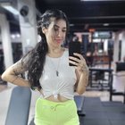 Taking that selfie at the gym. Braless and pantieless. With a camel toe as a bonus!
