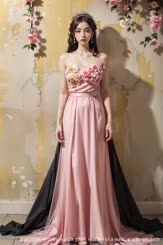 a woman wearing a pink gown in front of a wall . 