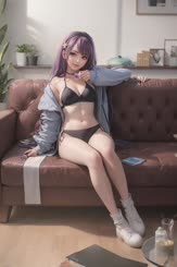 a woman sitting on a couch wearing a bikini