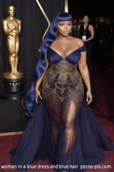 a woman in a blue dress and blue hair 