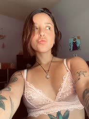 Beautiful Bride in Pink: Tattoo Artwork and Piercings Show Her Unique Style