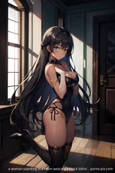 a woman standing in a room wearing a black bikini . 