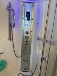 Anybody know what this fancy shower is called? My parents got a new place and the former owner didnâ€™t leave a manual and isnâ€™t responding so we canâ€™t drain it.