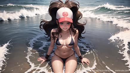 a woman in a hat sitting in the water . 