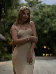 A Girl In A Long Dress Staring At The Camera: A Posing Dilemma Posing Dilemmas