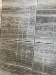 My cleaners used kaboom on my inside shower walls and now sheâ€™s freaking out because it wonâ€™t come out. Any help
