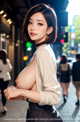 a woman is wearing a white shirt and has a big breast 