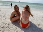 Zoom in, puddles under both girls
