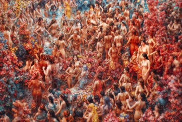  Nipple painting: A woman covered in red flowers and blue water