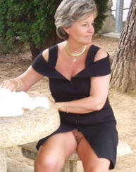 A Mature Lady's Intimate Moment: A Peek at Her Naughty Bits